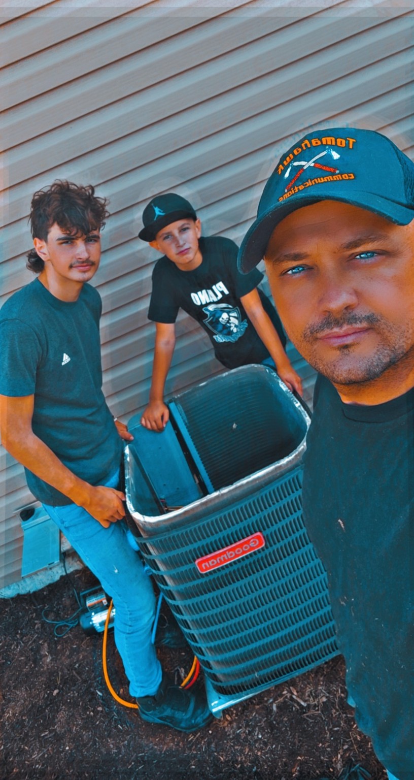 SteadyAir family crew working together on an outdoor HVAC system